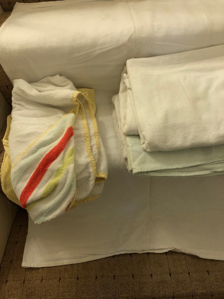 Assortments of blankets and hooded towels