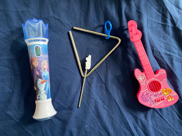 Frozen 2 sing along mike and some musical instruments