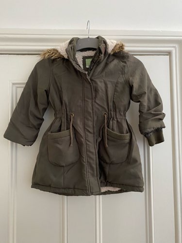 Khaki-coloured girls' parka. Fleece lining, hood. Collect Bush Hill Park, EN1.