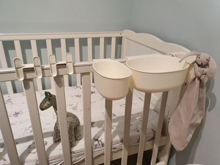 Organizer box for cot and a bin.