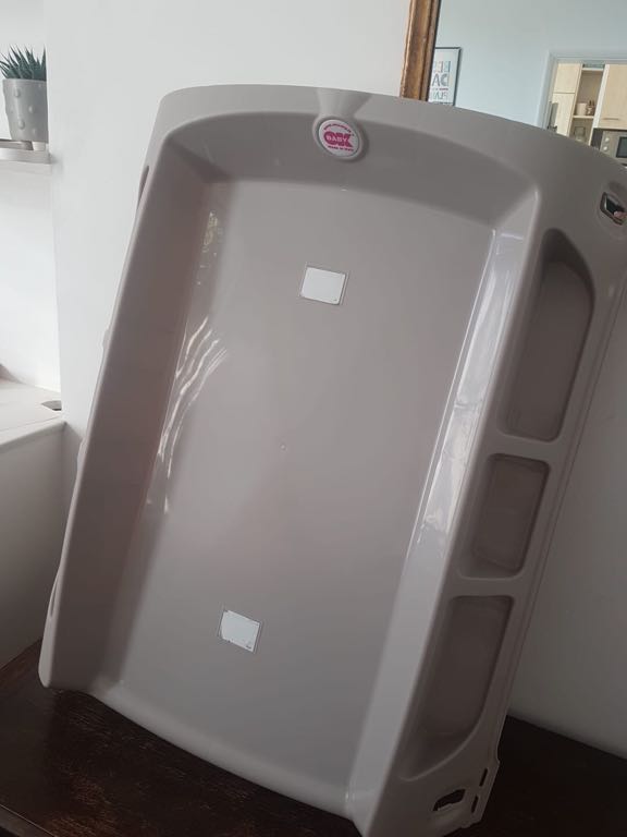 Over bath top cot changing unit