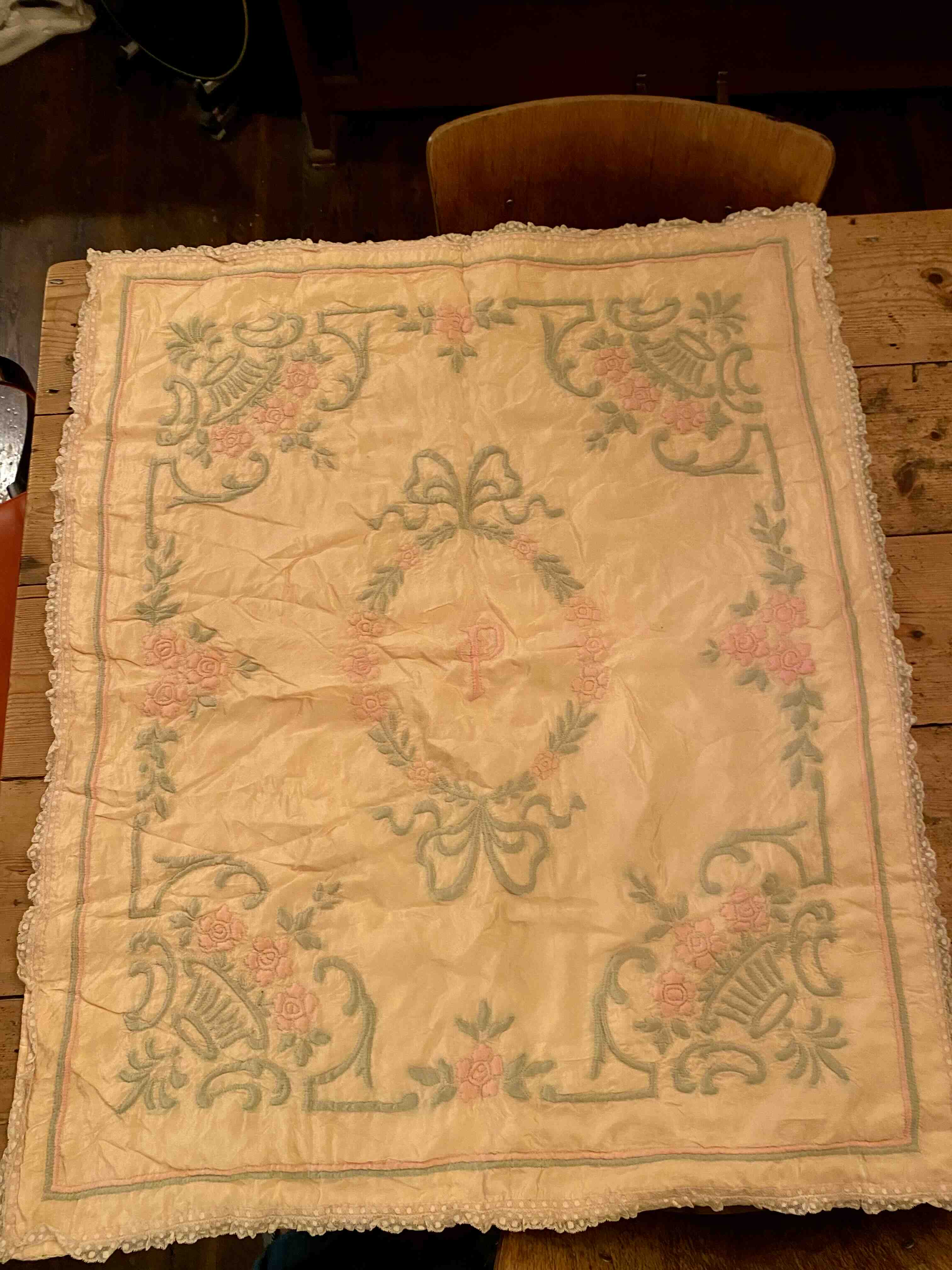 Vintage baby blanket with a P on it